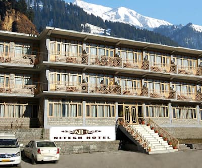 https://imgcld.yatra.com/ytimages/image/upload/t_hotel_yatra_city_desktop/v1439784266/Domestic Hotels/Hotels_Manali/Hotel Nitesh/Hotel_Front_View.jpg